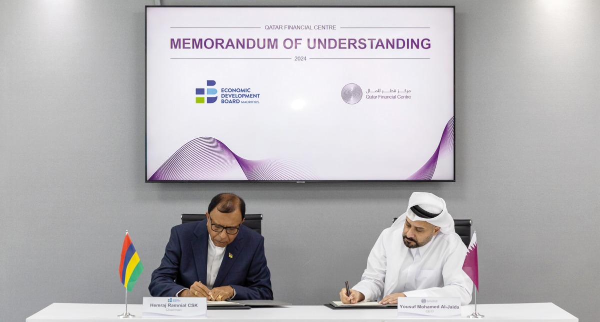 QFC CEO, Yousuf Mohamed Al Jaida and EDB Mauritius Chairman, Hemraj Ramnial CSK during the MoU signing.
