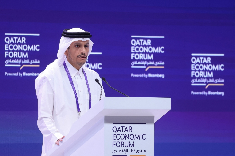 Prime Minister and Minister of Foreign Affairs H E Sheikh Mohammed bin Abdulrahman bin Jassim Al Thani addresses the opening session of the Qatar Economic Forum in Doha on May 14, 2024. (Photo by Karim Jaafar / AFP)
 