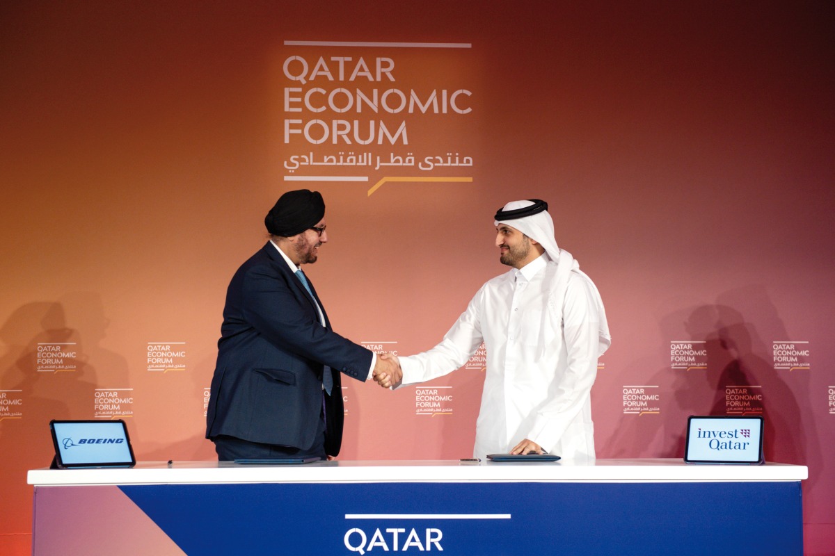 CEO of Invest Qatar, Sheikh Ali Alwaleed Al Thani and President of Boeing Middle East, Türkiye, Africa and Central Asia, Kuljit Ghata-Aura, during the MoU signing.