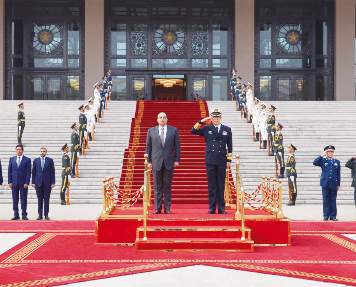 Deputy Prime Minister and Minister of State for Defense Affairs H E Dr. Khalid bin Mohammed Al Attiyah and China's Minister of Defense H E Admiral Dong Jun at the reception ceremony in Beijing.
