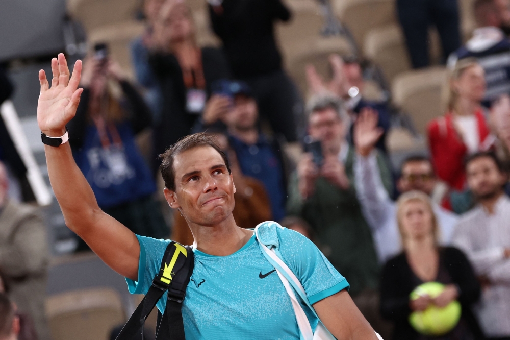 Spain's Rafael Nadal gestures as he leaves the court after losing against Germany's Alexander Zverev in their men's singles match on Court Philippe-Chatrier on day two of The French Open tennis tournament at The Roland Garros Complex in Paris on May 27, 2024. (Photo by Emmanuel Dunand / AFP)