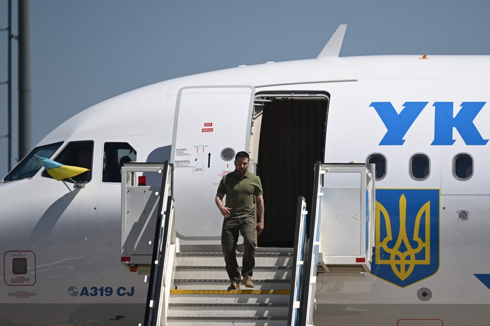 Ukraine's President Volodymyr Zelensky gets off his plane upon his arrival at Figo Maduro military airport in Lisbon on May 28, 2024. (Photo by Patricia De Melo Moreira / AFP)
