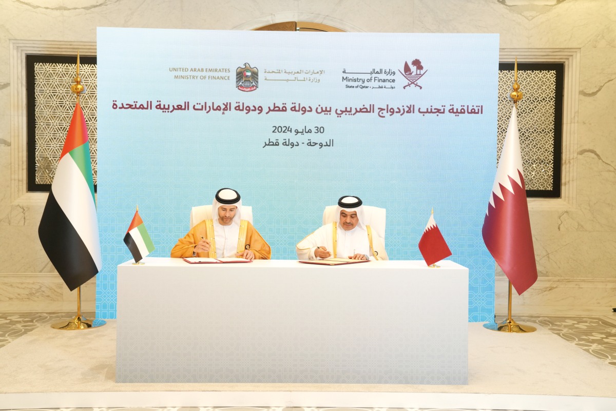 Minister of Finance, H E Ali bin Ahmed Al Kuwari and UAE Minister of State for Financial Affairs, H E Mohamed Hadi Al Hussaini, during the signing agreement.