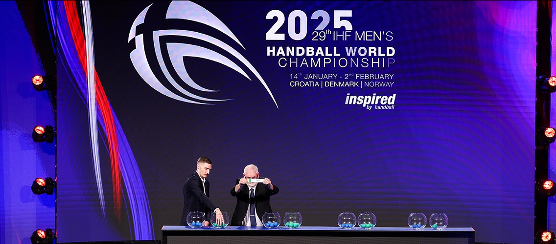 An official picks a team during the draw ceremony.