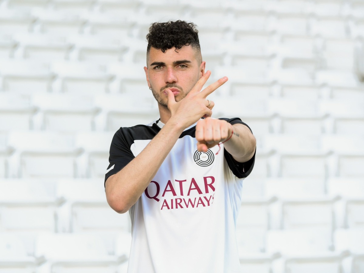 Rafa Mujica poses in Al Sadd jersey.