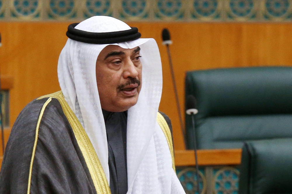 (Files)  Sheikh Sabah Khaled Al-Hamad Al-Sabah, then Kuwait's prime minister speaks during a parliament session at the National Assembly in Kuwait City on March 7, 2022. (Photo by Yasser Al-Zayyat / AFP)