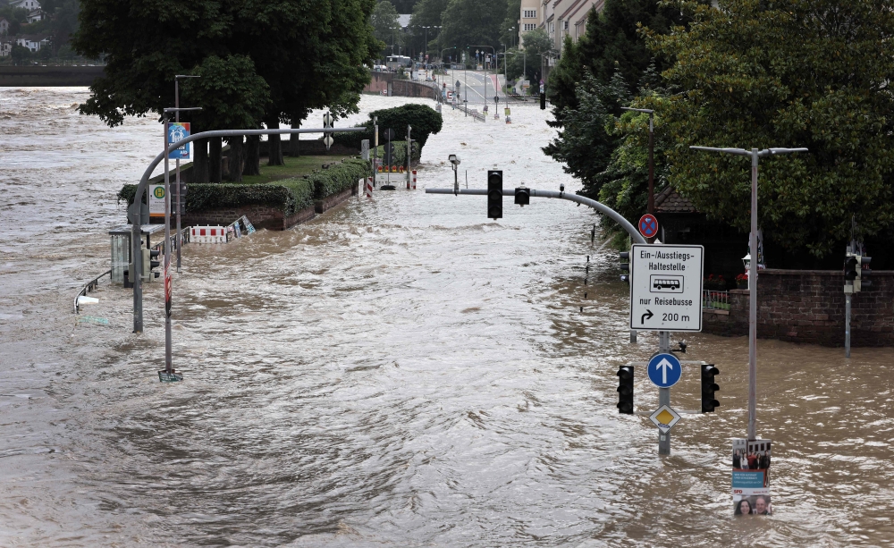 The historic part of Heidelberg is flooded during high water of the Neckar river in Heidelberg, southwestern Germany on June 3, 2024. Photo by Daniel ROLAND / AFP.