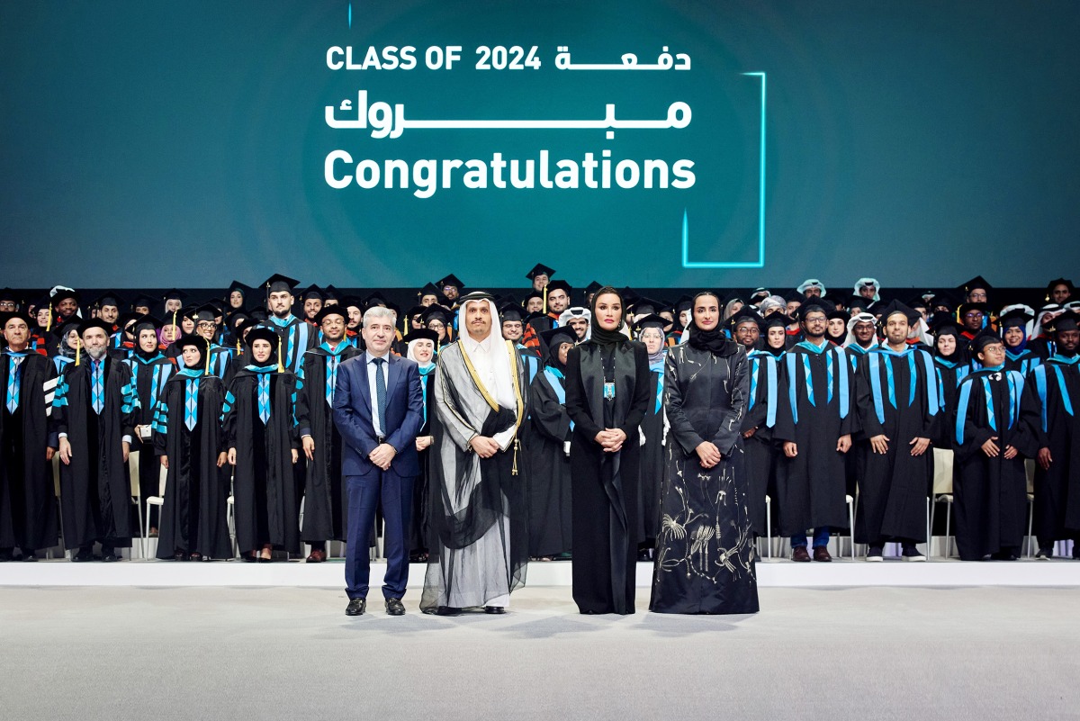 Chairperson of Qatar Foundation H H Sheikha Moza bint Nasser, Prime Minister and Minister of Foreign Affairs H E Sheikh Mohammed bin Abdulrahman bin Jassim Al Thani, Vice Chairperson and CEO of Qatar Foundation H E Sheikha Hind bint Hamad Al Thani, and President of Hamad Bin Khalifa University Dr. Ahmad M Hasnah with the graduates during QF’S 2024 Convocation ceremony.