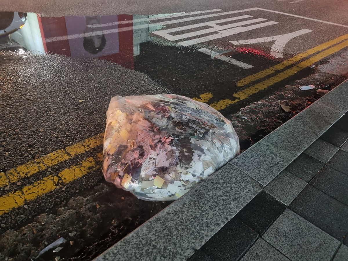Photo taken by the South Korean Defence Ministry between the night of June 1 and 2, 2024 and released on June 2, 2024 shows unidentified objects believed to be North Korean trash from balloons that crossed the inter-Korea border, on a street in Seoul. Photo by Handout / South Korean Defence Ministry / AFP. 