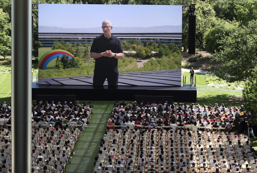 Apple CEO Tim Cook delivers remarks at the start of the Apple Worldwide Developers Conference (WWDC) on June 10, 2024 in Cupertino, California. (Photo by Justin Sullivan/Getty Images via AFP).