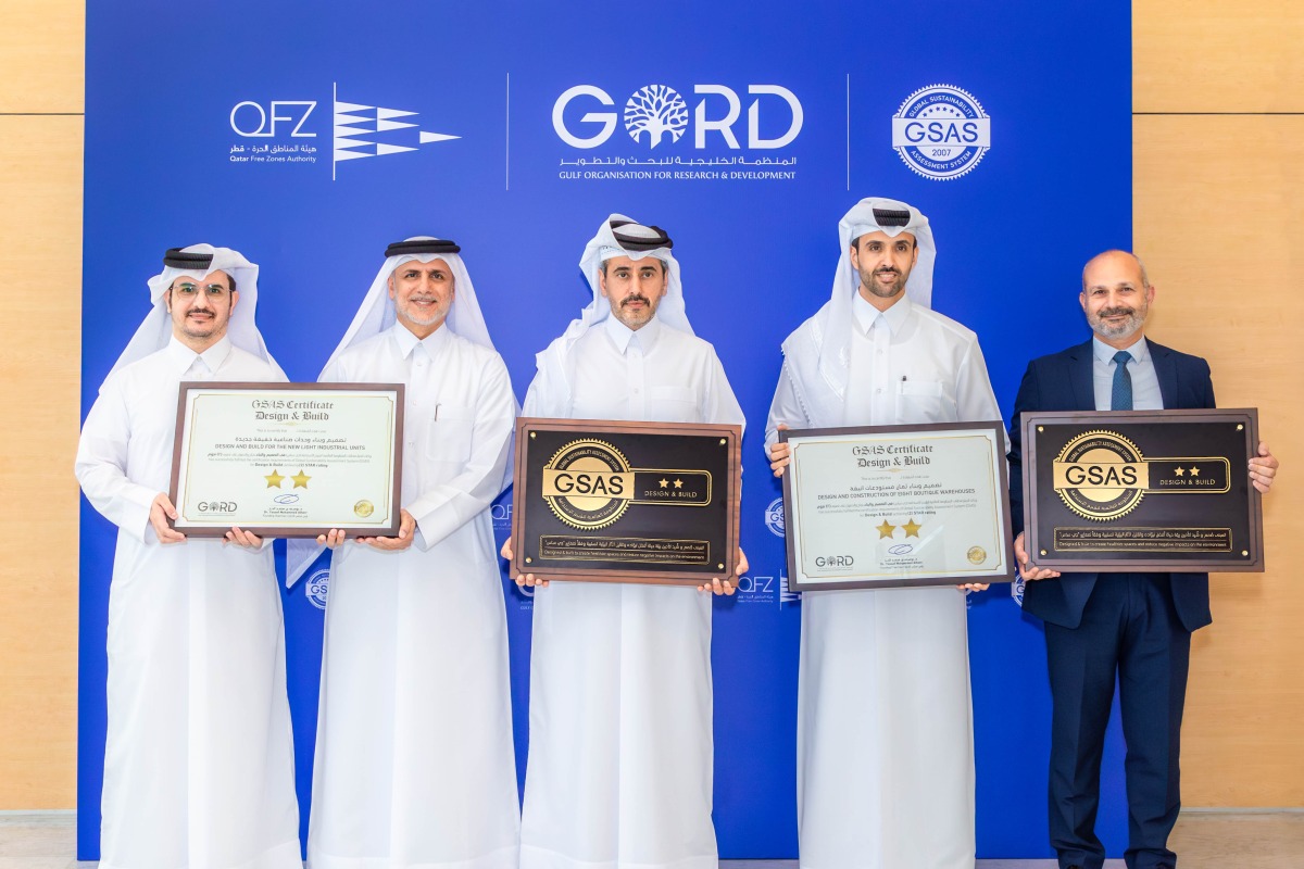 Dr. Yousef Alhorr, Founding Chairman of GORD, Eng. Ali Al Khalifa, Chief Executive Officer for Zones Development at QFZ, with other officials during the awarding ceremony.