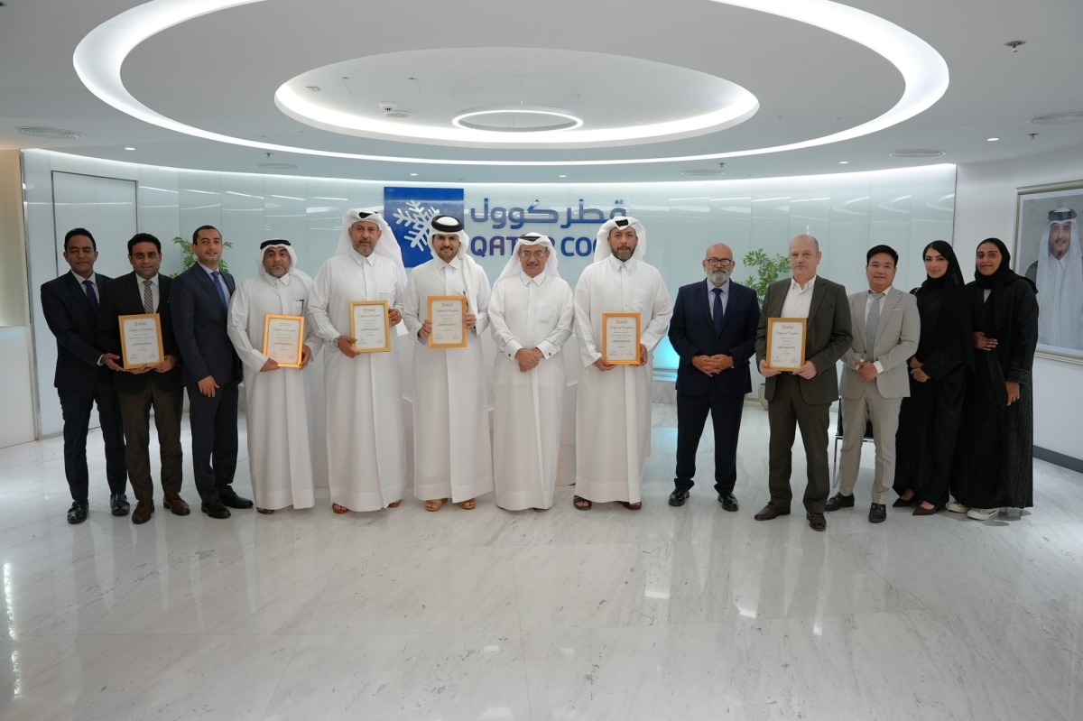 CEO of Qatar Cool, Yasser Al Jaidah along with other officials during the recognition ceremony.