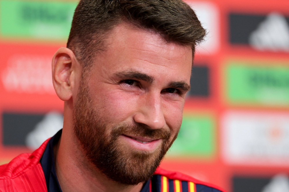 Spain's goalkeeper #23 Unai Simon addresses a press conference at the media centre at the team base in Donaueschingen, on June 17, 2024. (Photo by Lluis Gene / AFP)
 