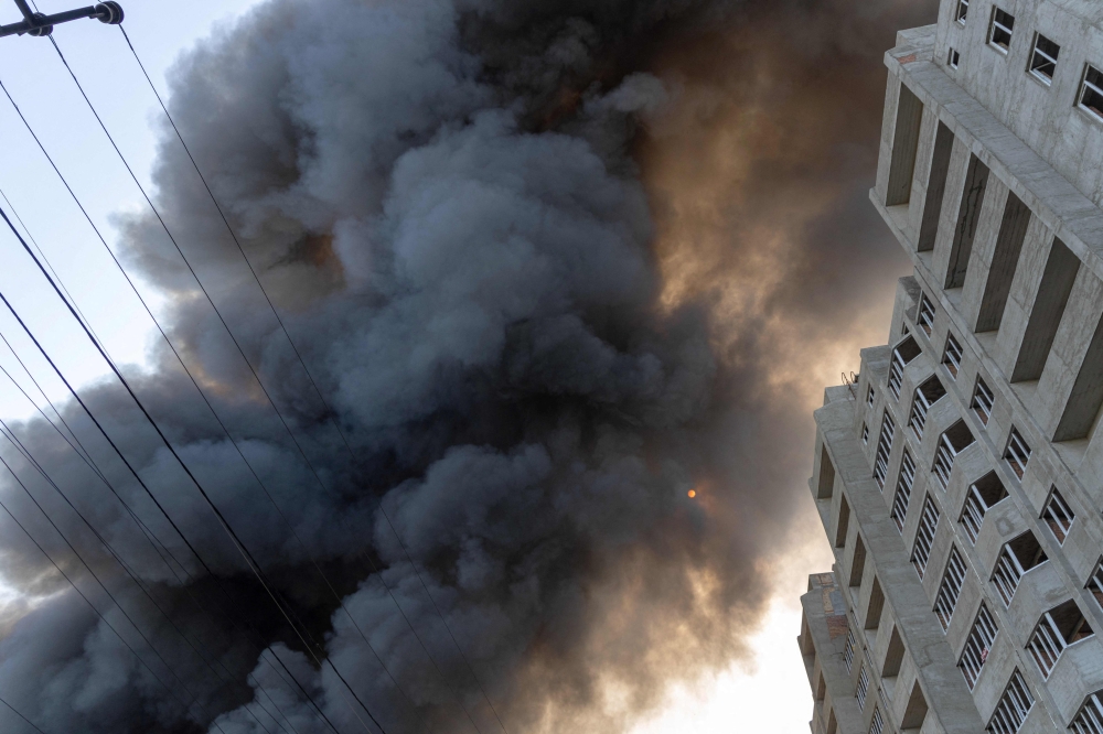 Smoke rises following a Russian missile strike in Odesa, on June 24, 2024, amid the Russian invasion of Ukraine. (Photo by Oleksandr Gimanov / AFP)
