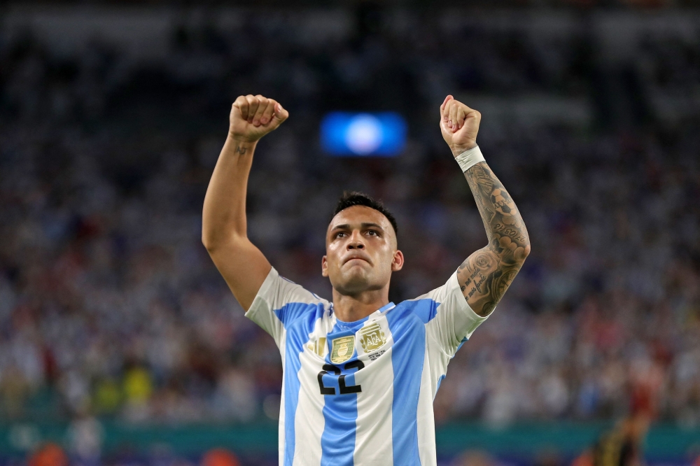 Argentina's forward Lautaro Martinez celebrates scoring his team's first goal during the Conmebol 2024 Copa America tournament on June 29, 2024. (Photo by Chris Arjoon / AFP)