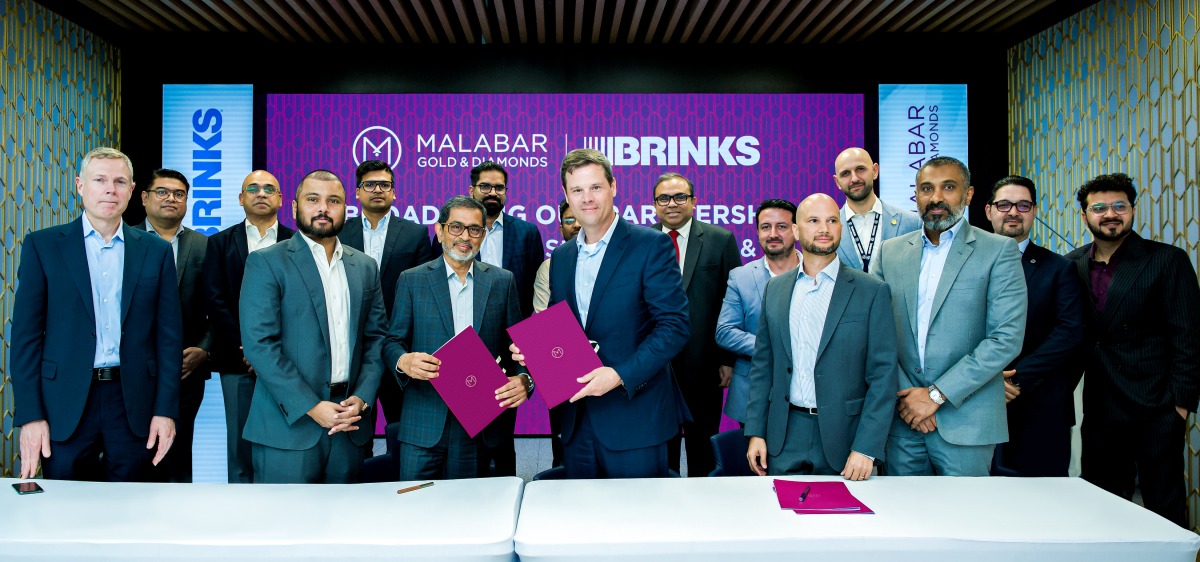 Officials from Malabar Gold & Diamonds and Brink's Inc. during the agreement signing.