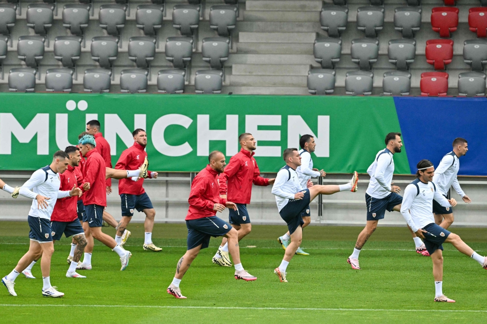 Romania's players attend an MD-1 training session at the FC Bayern Campus in Munich on July 1, 2024, on the eve of the UEFA Euro 2024 round of 16 football match against The Netherlands. (Photo by Miguel Medina / AFP)