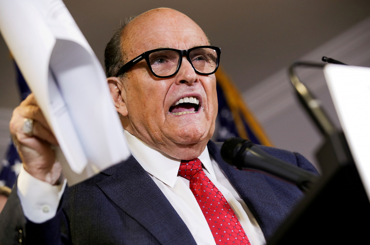 FILE PHOTO: Former New York City Mayor Rudy Giuliani, then-personal attorney to U.S. President Donald Trump, speaks about the 2020 U.S. presidential election results during a news conference in Washington, U.S., November 19, 2020. REUTERS/Jonathan Ernst/F


