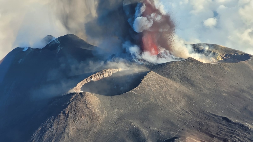 A picture shows the eruption of the Mount Etna volcano on July 4, 2024 in Sicily. (Photo by Giuseppe Distefano / various sources / AFP)
