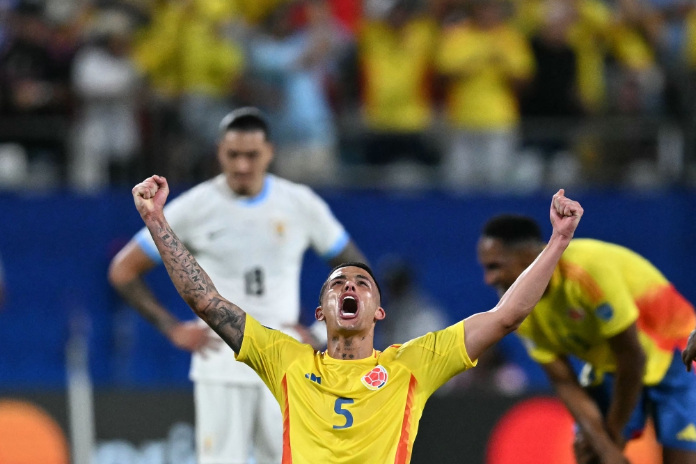 Colombia's midfielder Kevin Castano celebrates his team's victory in the Conmebol 2024 Copa America tournament on July 10, 2024. (Photo by Chandan Khanna / AFP)