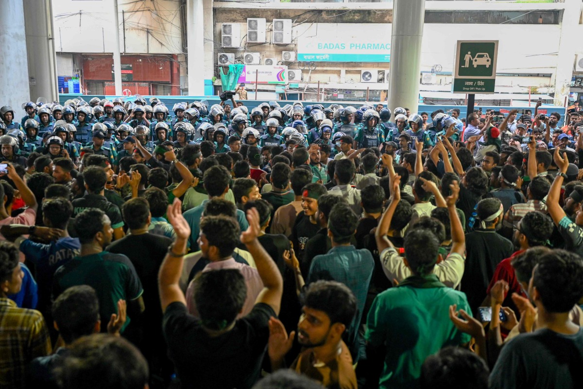 Students protest to demand merit-based system for civil service jobs in Dhaka on July 11, 2024. (Photo by MUNIR UZ ZAMAN / AFP)
