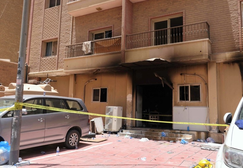 File: The building which was engulfed by fire, in Kuwait City, on June 12, 2024. (Photo by Yasser Al-Zayyat / AFP)