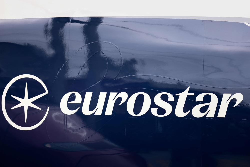 This picture shows the new logo of high-speed train operator Eurostar on a Eurostar train at the the Bruxelles-Midi train station in Brussels, on January 24, 2023. Photo by Kenzo TRIBOUILLARD / AFP