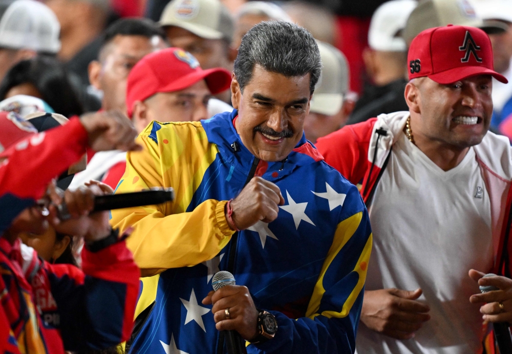 Venezuelan President and presidential candidate Nicolas Maduro reacts following the presidential election results in Caracas on July 29, 2024. (Photo by Juan Barreto / AFP)