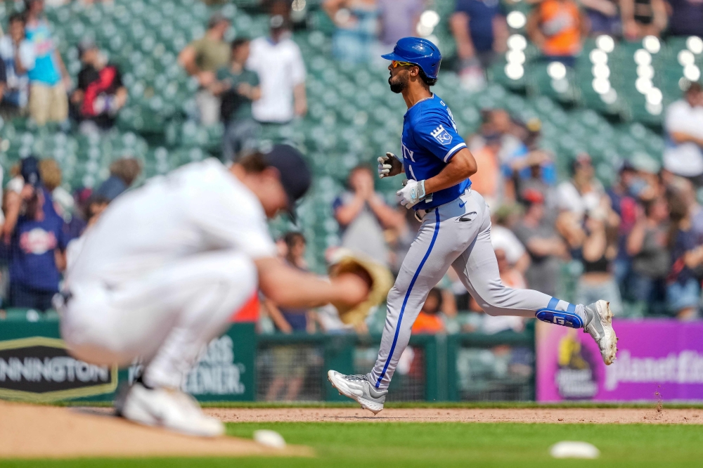 Shelby Miller #7 of the Detroit Tigers (foreground L) crouches on the mound as MJ Melendez #1 of the Kansas City Royals rounds the bases after hitting a home run during the top of the ninth inning at Comerica Park on August 04, 2024 in Detroit, Michigan. (Photo by Nic Antaya / GETTY IMAGES NORTH AMERICA / Getty Images via AFP)