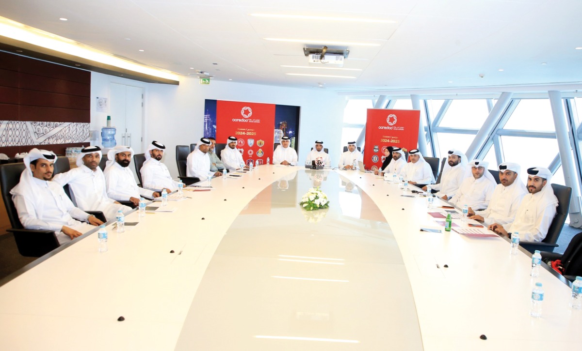 QSL Competitions Department Director Ahmed Salman Al Adsani, Head of Football Operations Ahmed Abdullah Al Sayed, representative of Qatar Football Association’s Referees Department Abdullah Al Balooshi, and club representatives during the meeting, yesterday.

