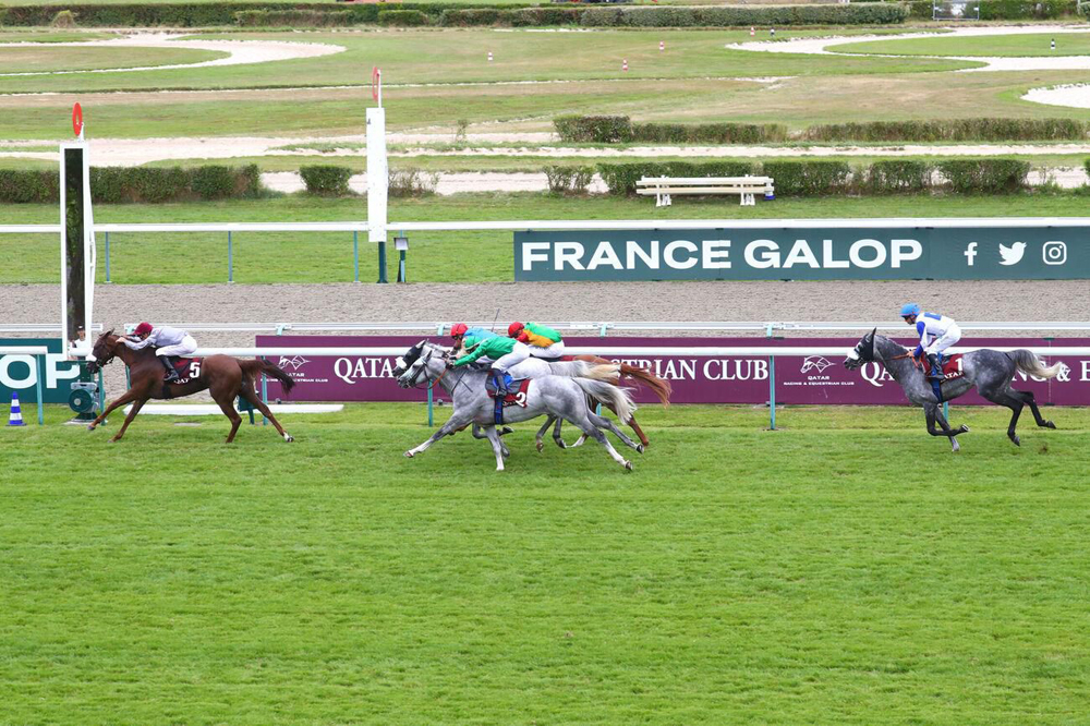Jockey Christophe Soumillon (left) guides Nour Al Maury towards victory in the Gr.1 (PA) Doha Cup - Prix Manganate at Deauville, France.
