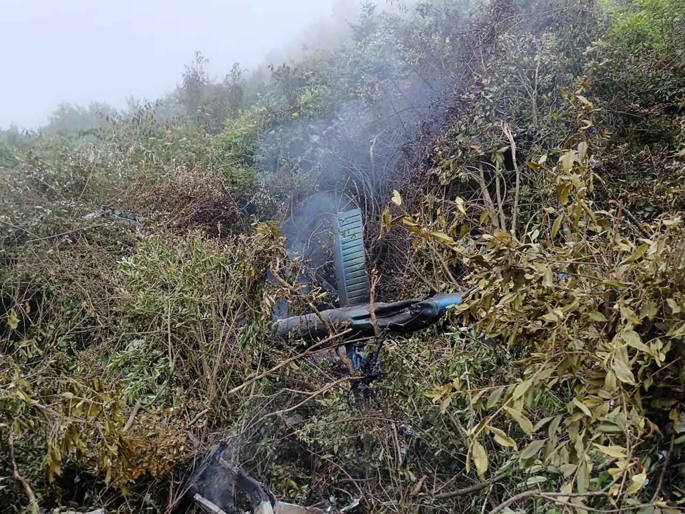 This handout photograph taken on August 7, 2024 and released by the Nepal Army shows the remains of a Air Dynasty chopper that crashed in Nuwakot district on the outskirts of Kathmandu. (Photo by Nepalese Army / AFP)
