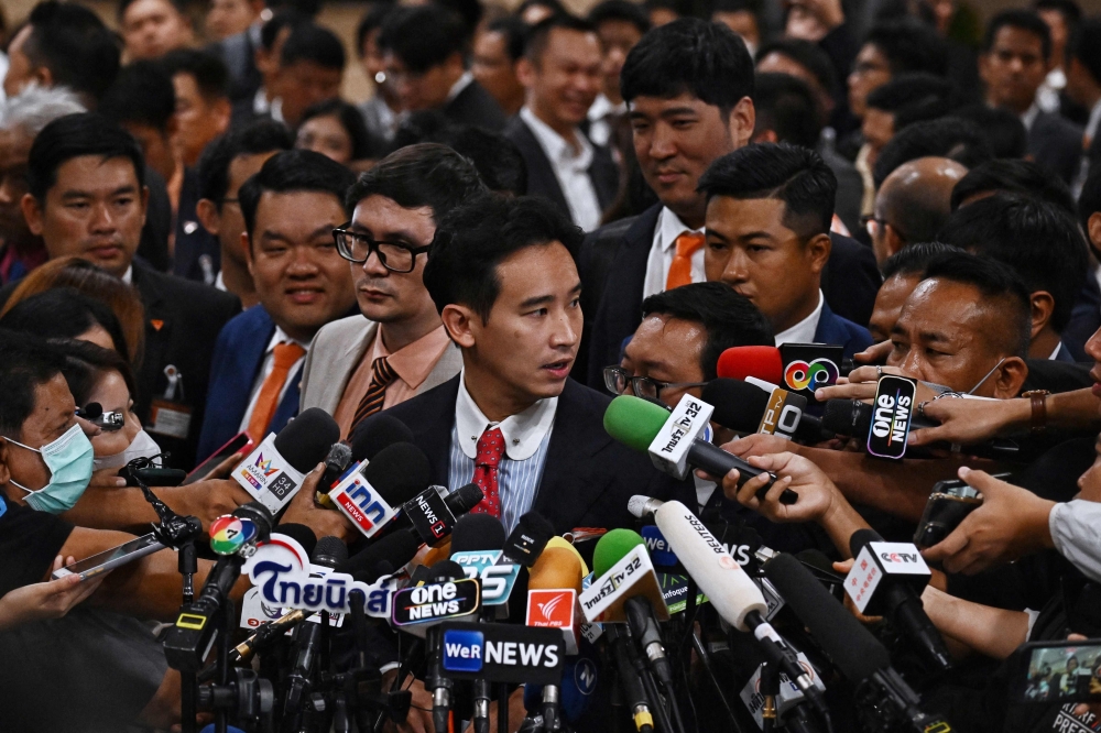 Move Forward Party Leader and prime ministerial candidate Pita Limjaroenrat speaks to the media in Thai Parliament after the parliamentary vote for the premiership in Bangkok on July 13, 2023. (Photo by Lillian SUWANRUMPHA / AFP)

