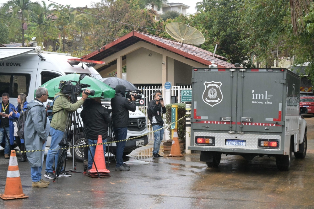 A police forensic truck arrives at the Recanto Florido Condominium, where an airplane crashed with 61 people on board in Vinhedo, Sao Paulo State, Brazil, on August 10, 2024. (Photo by NELSON ALMEIDA / AFP)
