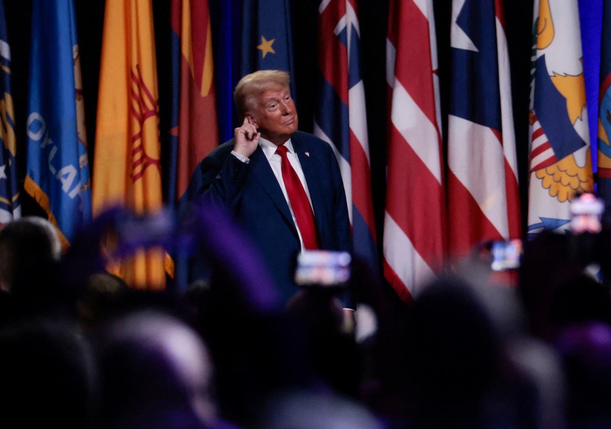 Former US President and Republican presidential candidate Donald Trump gives remarks at the National Guard Association of the United States' 146th General Conference & Exhibition Michigan in Detroit, Michigan, on August 26, 2024. (Photo by JEFF KOWALSKY / AFP)

