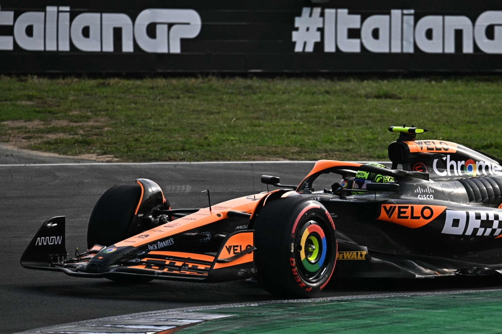 McLaren's British driver Lando Norris drives during the qualifying session, ahead of the Italian Formula One Grand Prix at Autodromo Nazionale Monza circuit, in Monza on August 31, 2024. (Photo by Gabriel BOUYS / AFP)
