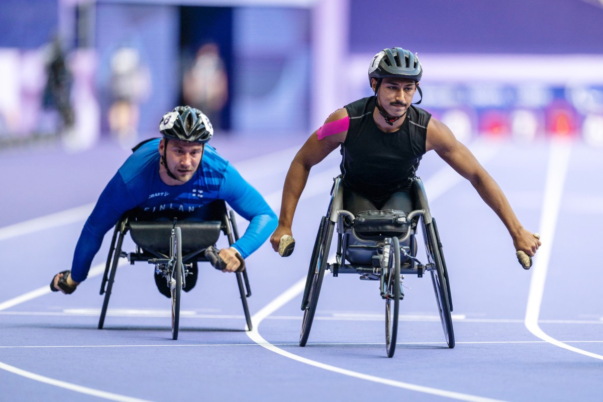 Qatars' Ali Arshad (right) competes in the men’s 100m T34 final during the Paris 2024 Paralympic Games. 