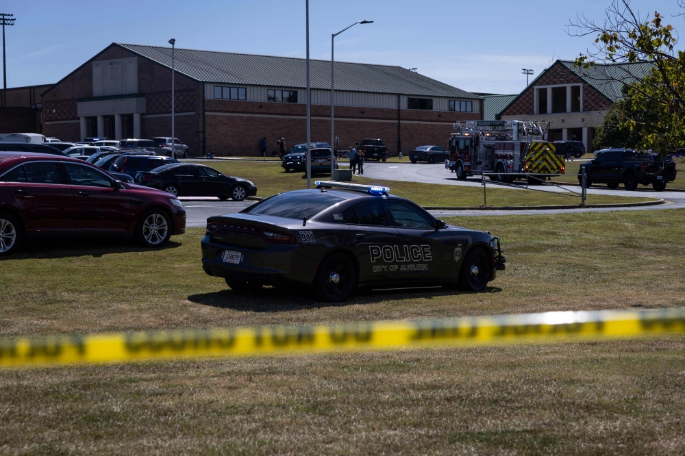 Caution tape surrounds Apalachee High School in Winder, Georgia, on September 4, 2024. (Photo by CHRISTIAN MONTERROSA / AFP)
