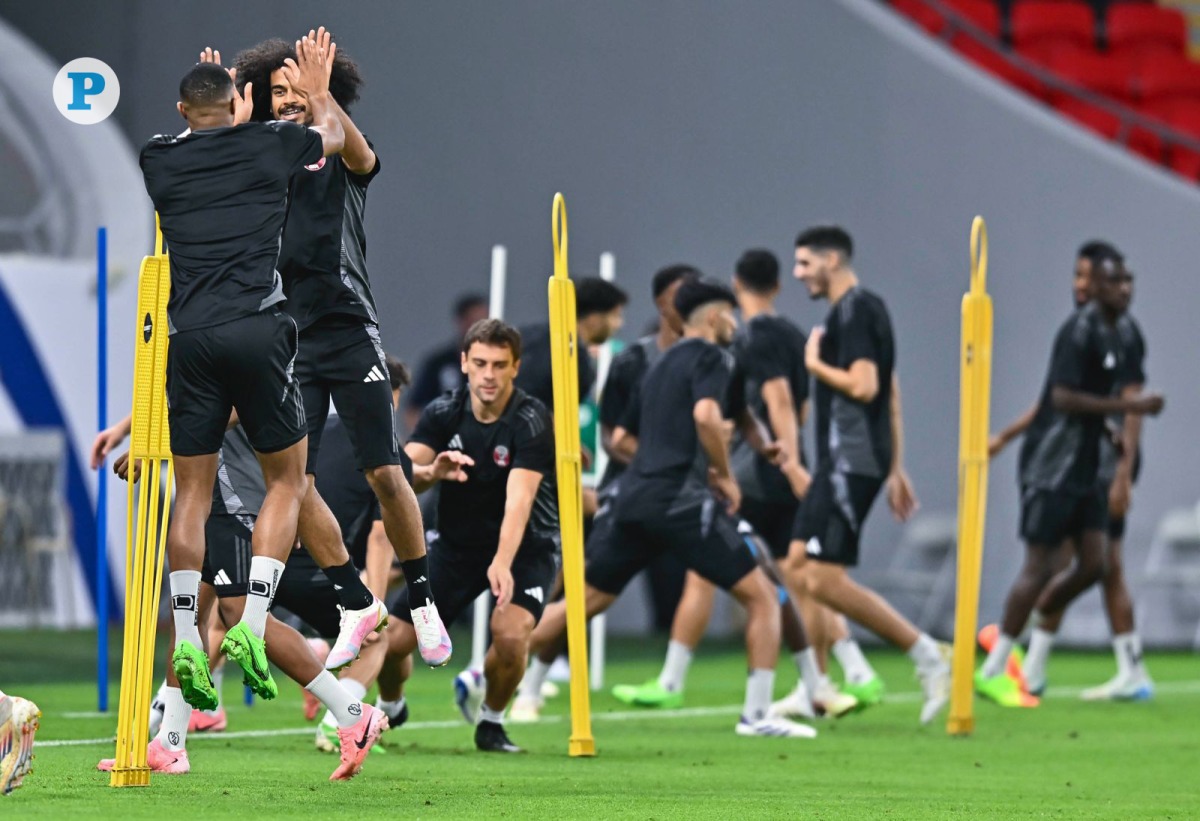 Qatar players during a training session at the Ahmad Bin Ali Stadium yesterday. Pic: Mohamed Farag / The Peninsula
