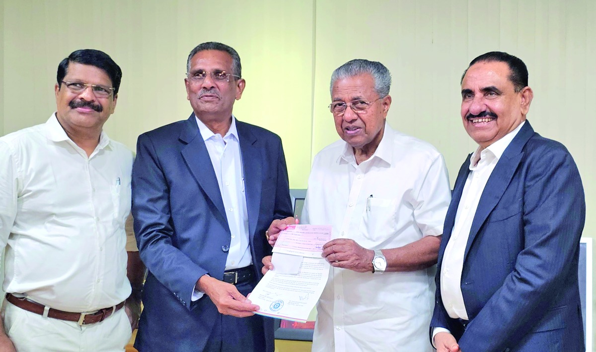 Chairman of Safari Group of Companies, Aboobacker Madappat, and Managing Director, Zainul Abideen, handing over the cheque to Chief Minister of Kerala Pinarayi Vijayan at Government Secretariat, Thiruvananthapuram.
