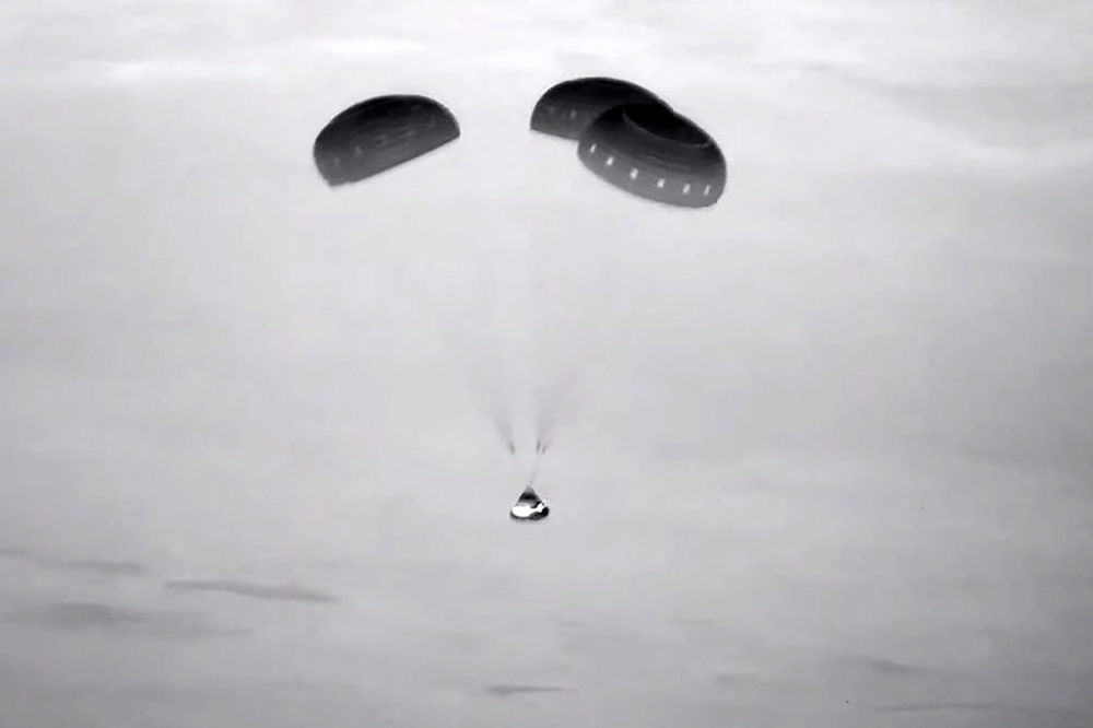 This video grab courtesy of NASA taken on September 6, 2024 shows Boeing's Starliner approaching the landing site at White Sands Space Harbor in White Sands, New Mexico. (Photo by Agustin Paullier / NASA / AFP)