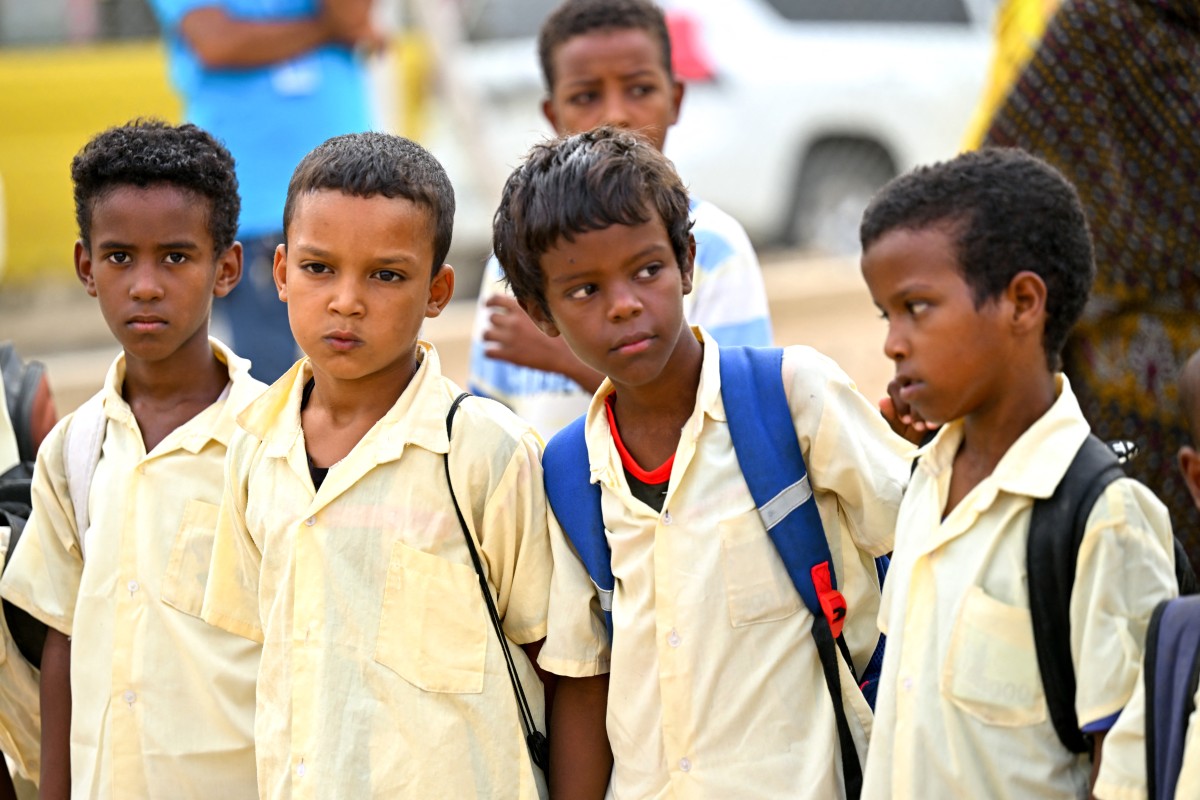 Photo used for demonstration purposes. School boys stand at the beginning of the new the academic year in Sudan's Red Sea State, at Wahda School west of Port Sudan, on September 16, 2024. Photo by AFP.