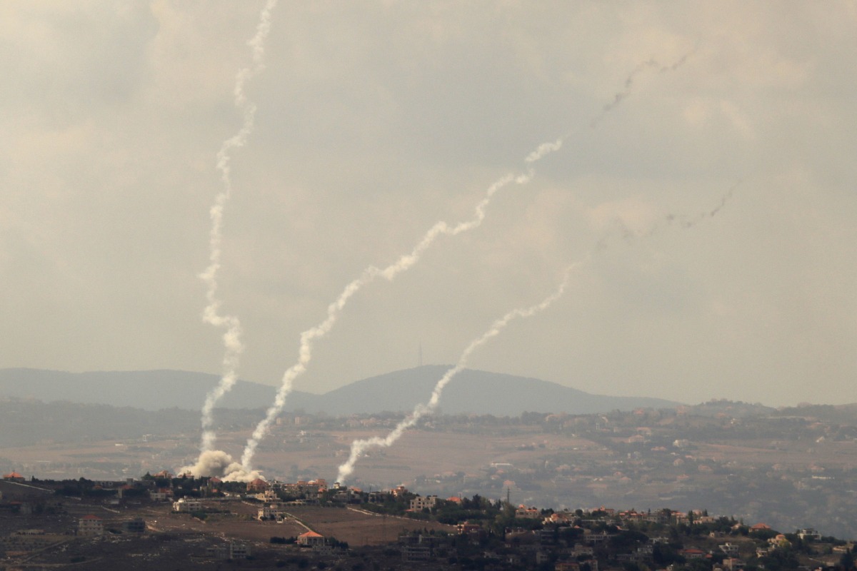 Smoke billows from the site of an Israeli airstrike on Lebanon's southern village of Taybeh on September 23, 2024. (Photo by Rabih DAHER / AFP)

