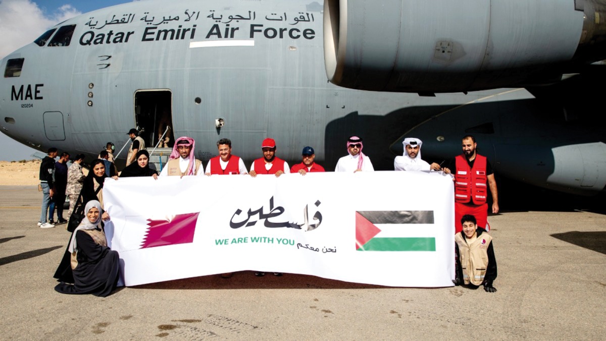 A file photo of a Qatari Armed Forces aircraft carrying humanitarian aid donated by the Qatar Fund For Development and Qatar Red Crescent Society for Gaza, in Al Arish, Egypt.