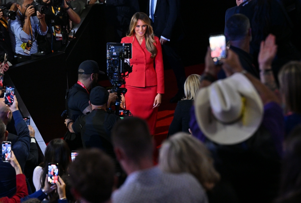 Melania Trump walks to the VIP box on the final day of the Republican convention in July. (Photo by Ricky Carioti/The Washington Post)