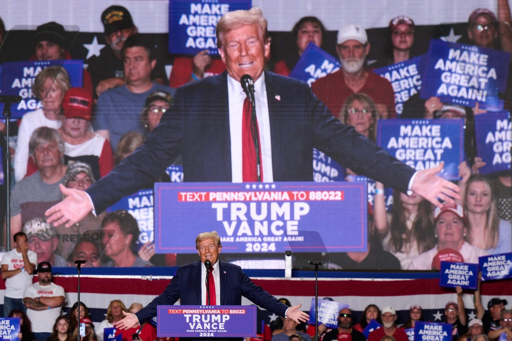 Former US President and Republican presidential candidate Donald Trump speaks during a campaign event at the Bayfront Convention Center in Erie, Pennsylvania, September 29, 2024. (Photo by Dustin Franz / AFP)