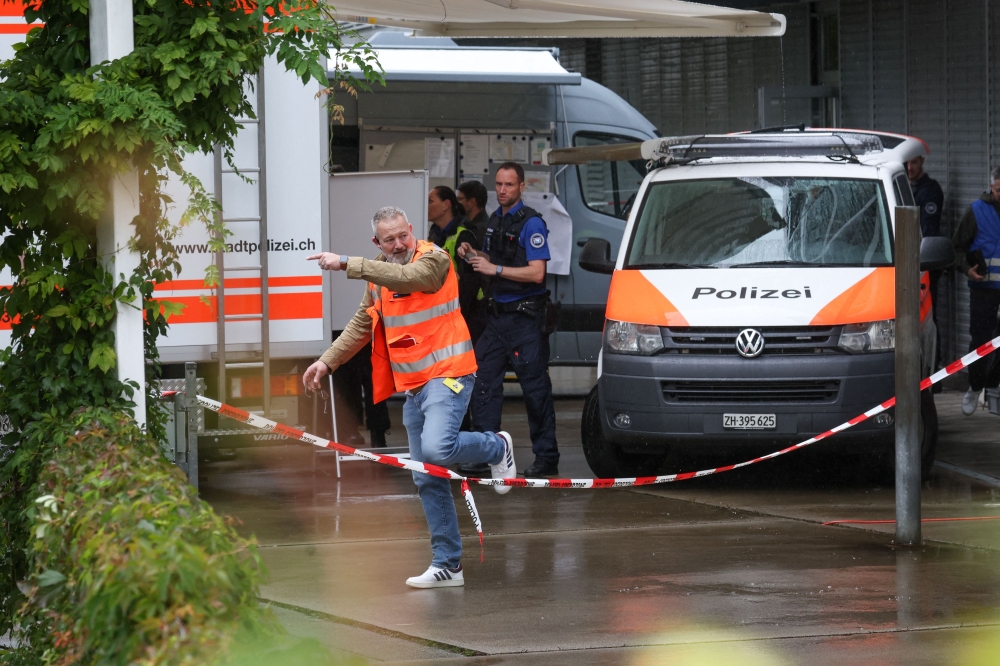 Police officers are seen outside of a daycare centre where a man attacked several children injuring three, before being arrested, in Zurich, Switzerland, on October 1, 2024. Photo by ARND WIEGMANN / AFP