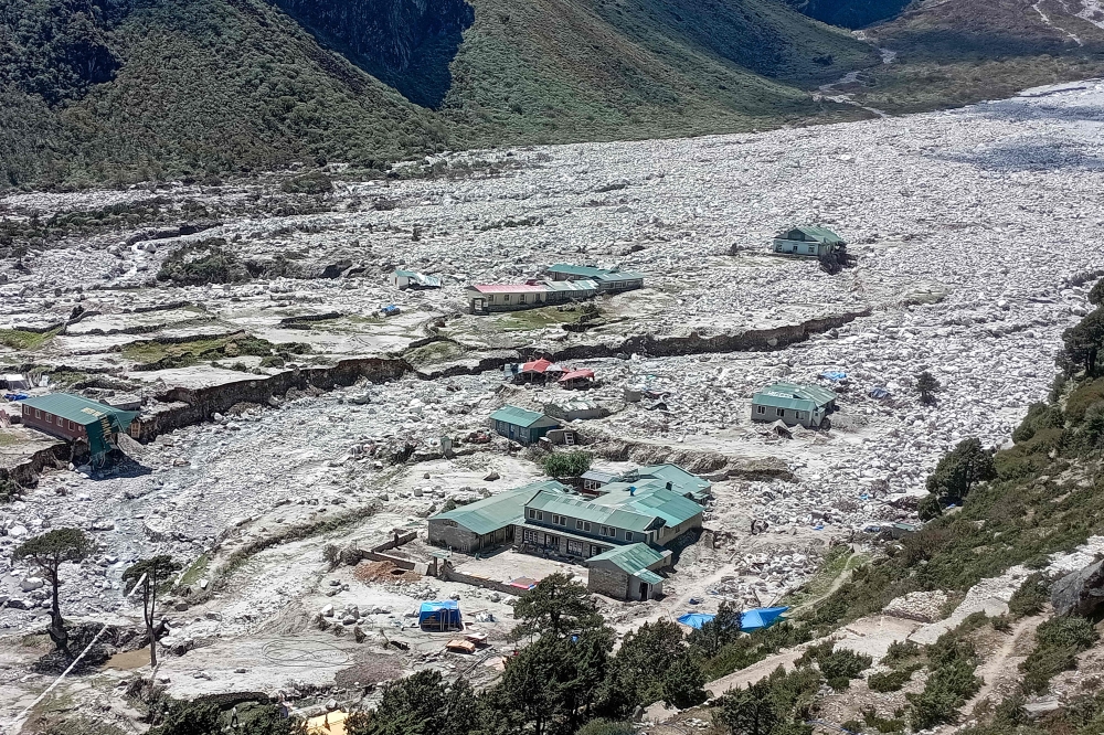 In this photograph taken on September 18, 2024, houses lie abandoned in the aftermath of flood caused by glacial lake outburst, at Thame village in Solukhumbu district. (Photo by Migma Nuru Sherpa / AFP)
 