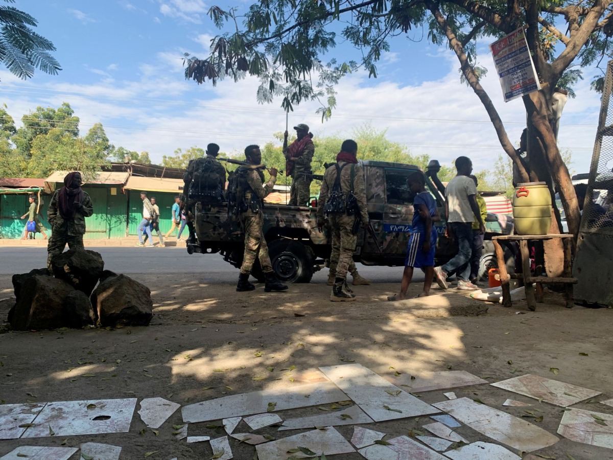 (FILES) Members of the Ethiopian National Defense Force (ENDF) prepare to head to mission in Sanja, Amhara region, near a border with Tigray, Ethiopia, on November 9, 2020. REUTERS/Tiksa Negeri

