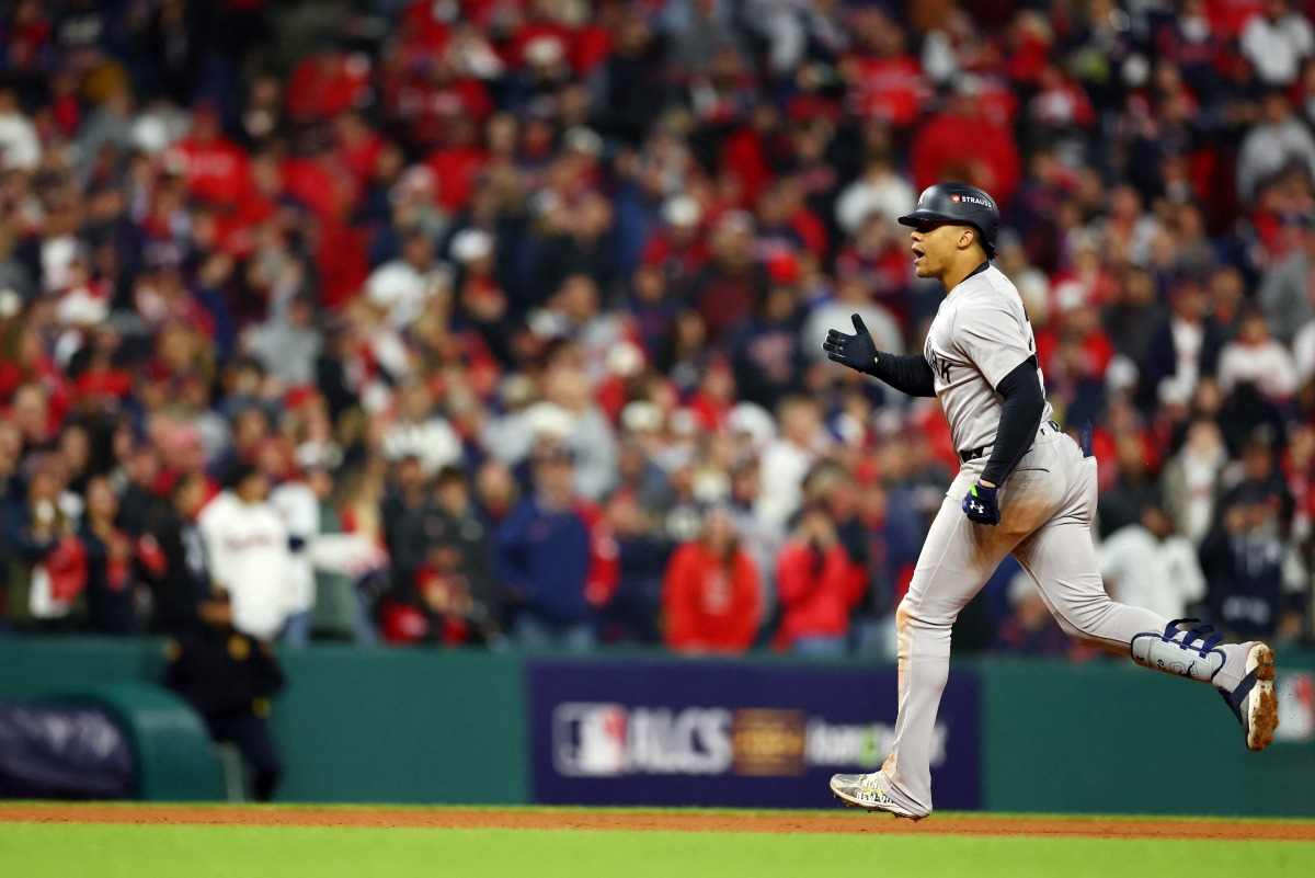 Juan Soto #22 of the New York Yankees rounds the bases after hitting a home run in the 10th inning against the Cleveland Guardians during Game Five of the American League Championship Series at Progressive Field on October 19, 2024 in Cleveland, Ohio. (Photo by Maddie Meyer / GETTY IMAGES NORTH AMERICA / Getty Images via AFP)